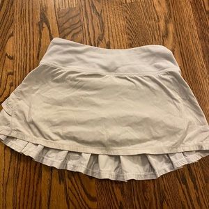 Girls white ivivva skirt.